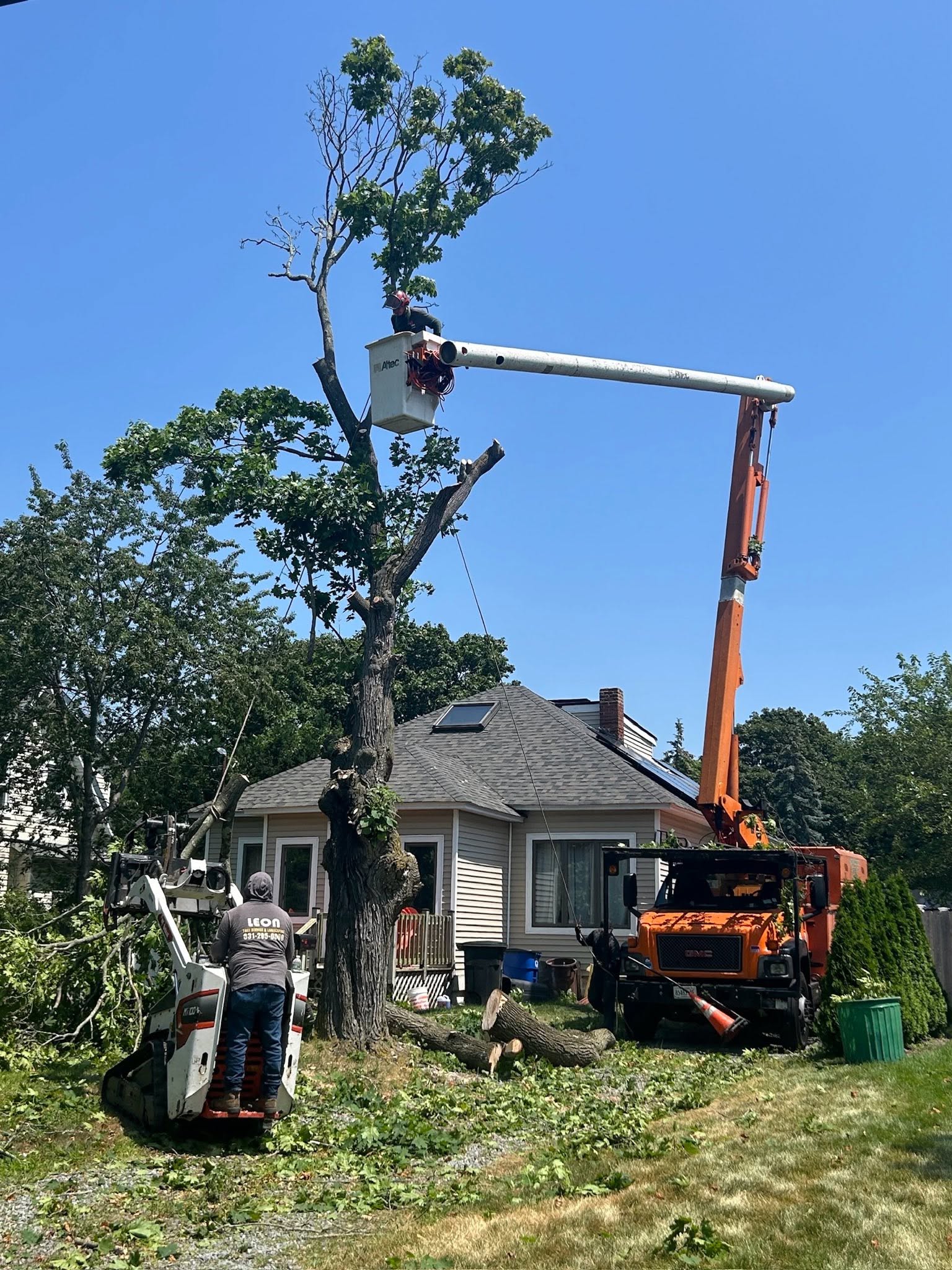 Altec Bucket Truck and Turf-Safe Bobcat MT100 at Greater Tampa Bay, FL Home Base HQ